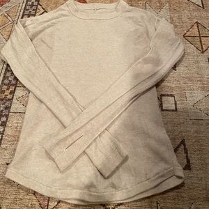 Lululemon sweater. Size 4. Oatmeal. Thumb holes. Great condition!